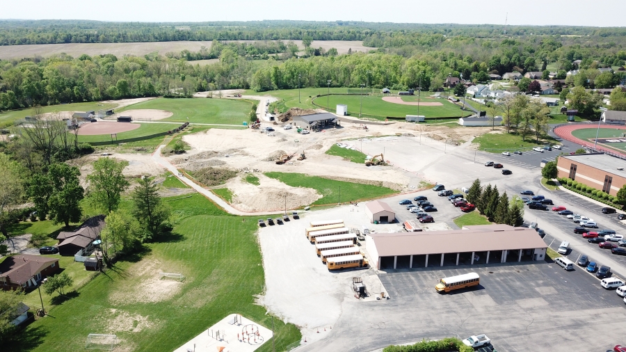 aerial view of a new construction and a parking lot